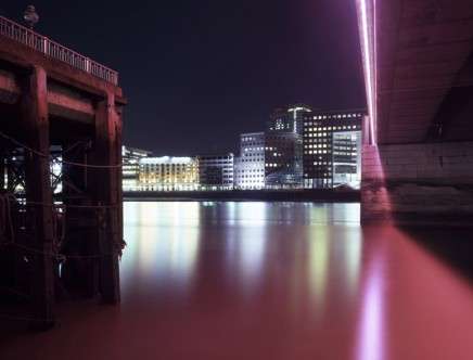 View across the river under pink light, EC4 - b